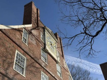 Brick building against a blue sky.