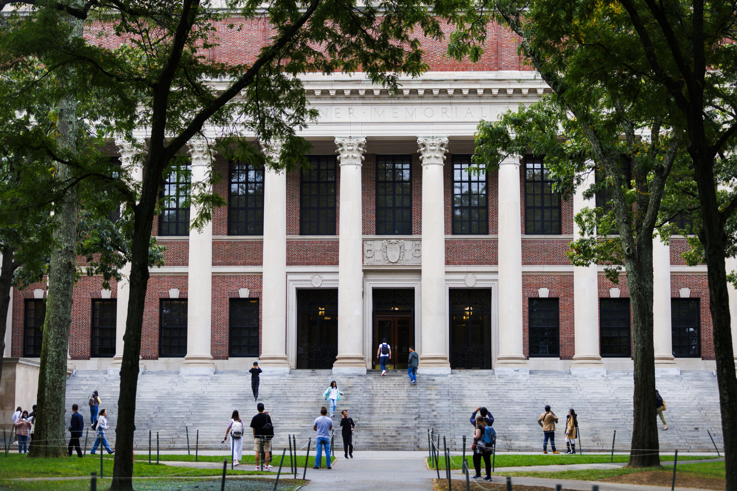 Harvard Students walking up the steps of Widener Library.