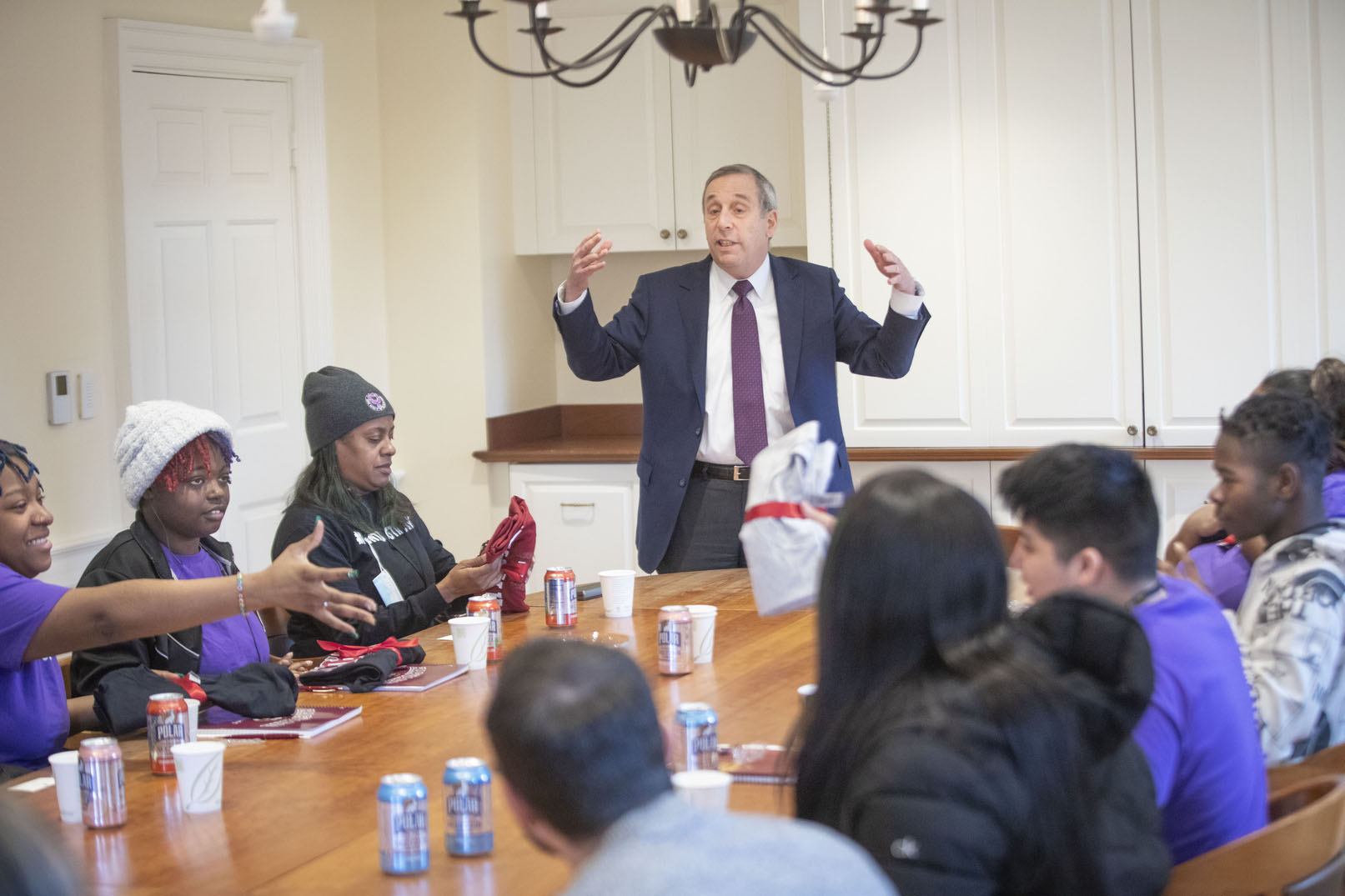 Larry Bacow talking to a group of students