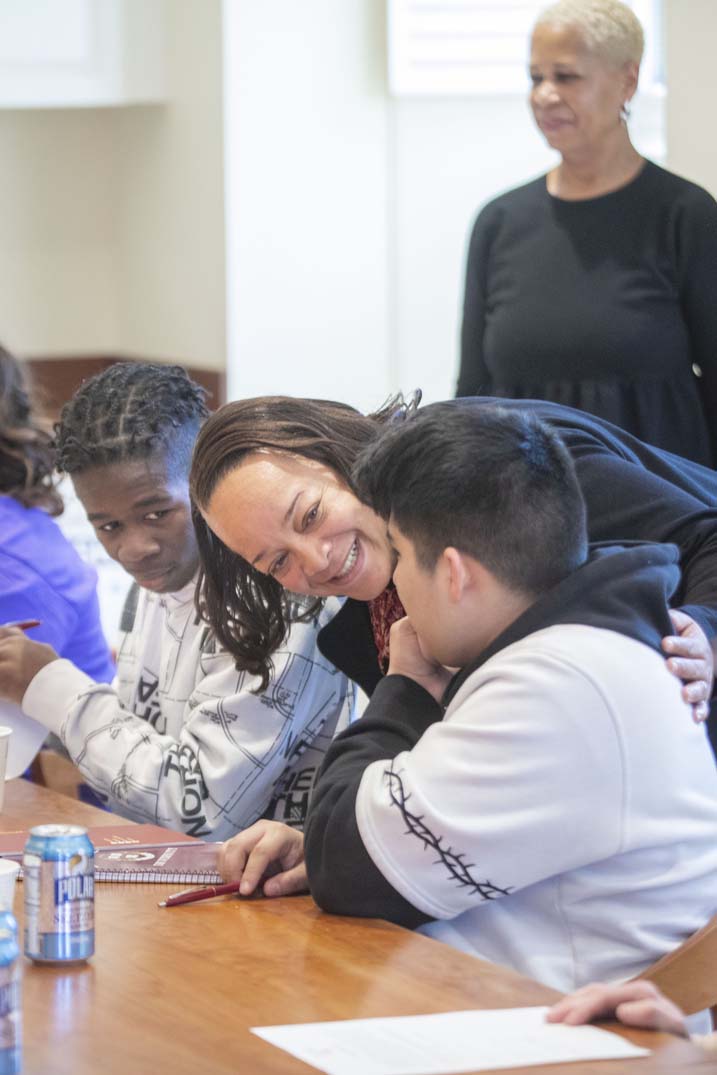 Dean Bridget Terry Long talking to a student