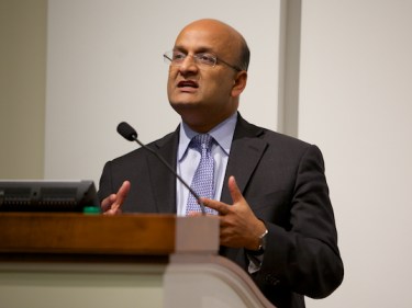 Dean Nitin Nohria speaking at a podium