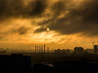 A city with smog and chimneys