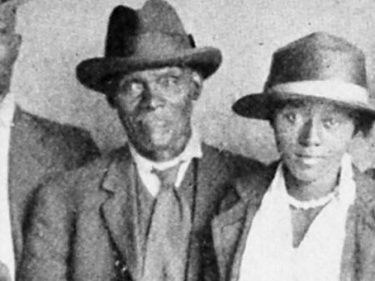 An old black and white photo of an African American family