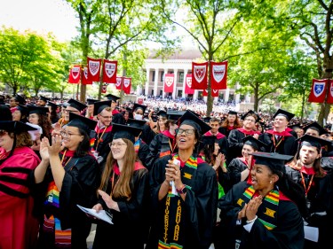 Graduating students cheering