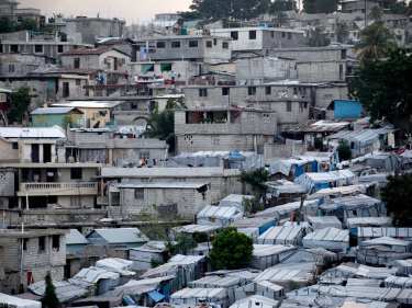 Houses and tents on a hill