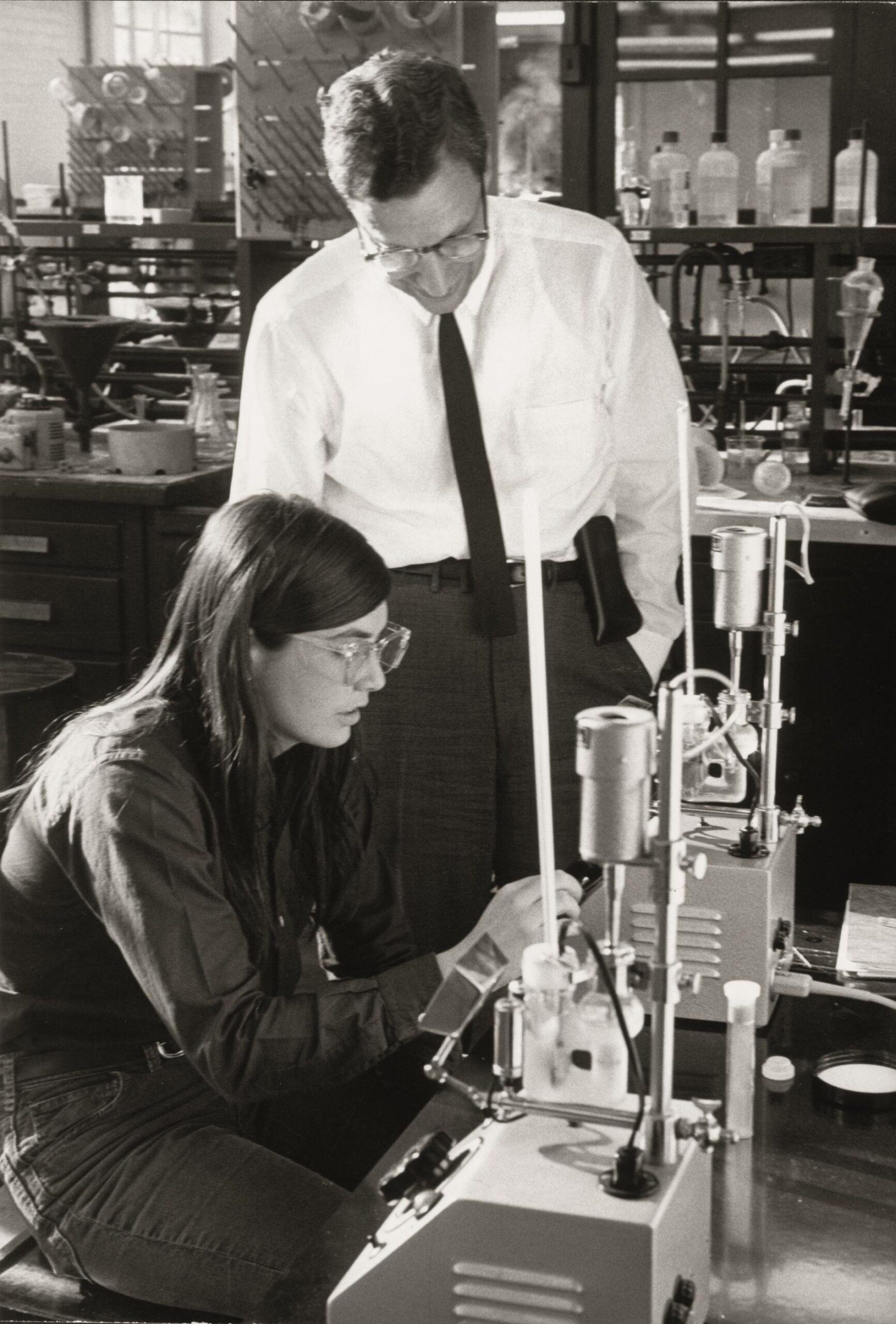 A student working with a professor