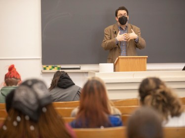 A teacher at the front of a class