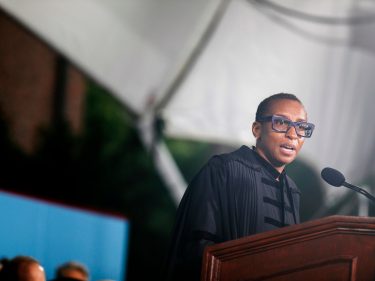 Claudine Gay at a podium