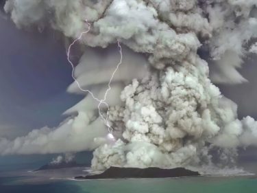 A volcano erupts