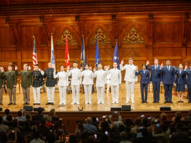 Military Officers standing on stage for the ROTC ceremony