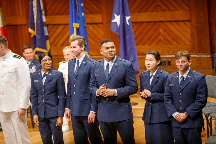 ROTC graduates stand on state